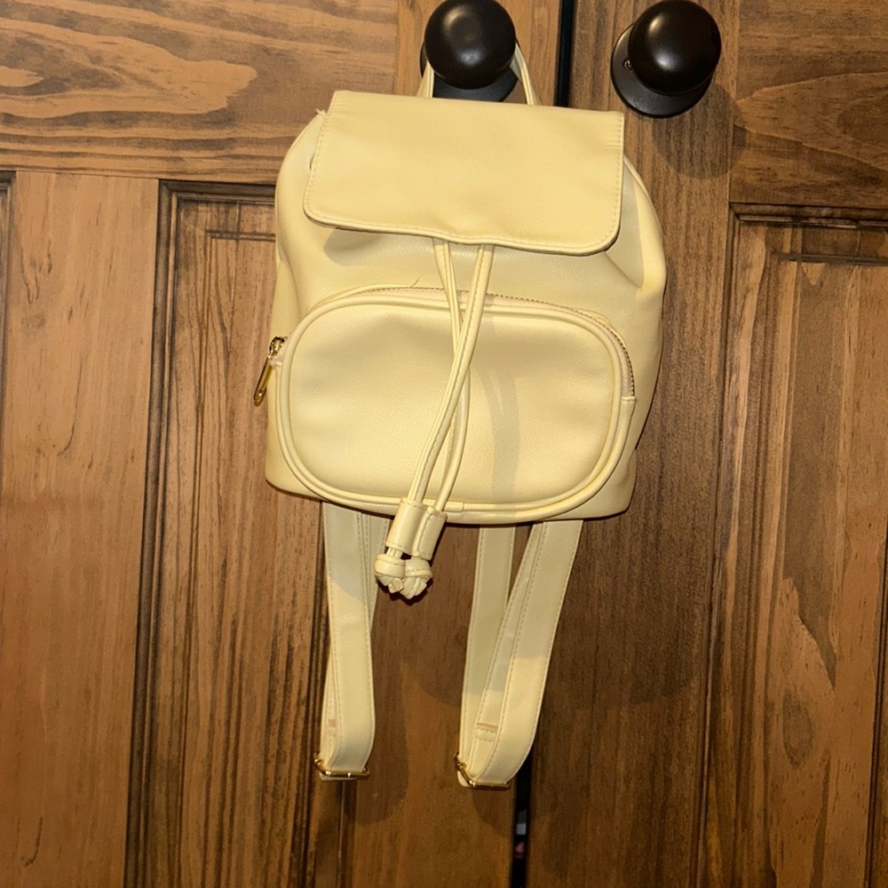 mini yellow backpack